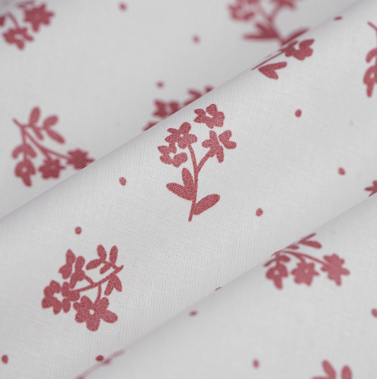 Coton enduit fleurs délicates rose