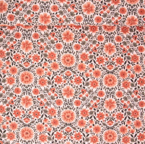 Fleuri orange sur fond rose pâle