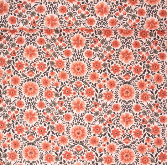 Fleuri orange sur fond rose pâle