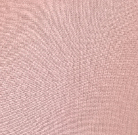 Coton enduit uni rose