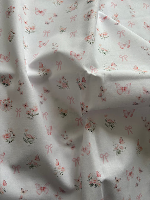 Papillons et noeuds rose