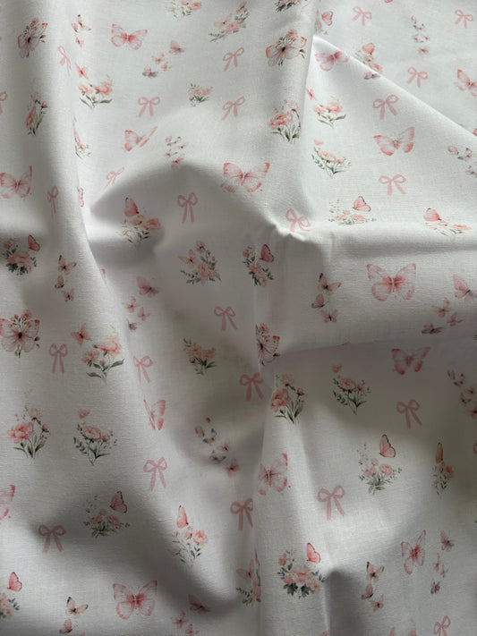 Papillons et noeuds rose